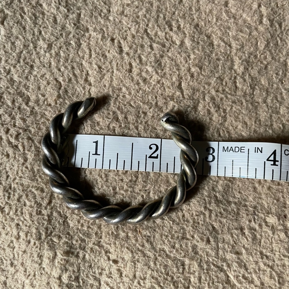 Heavy silvertone braided cuff bracelet